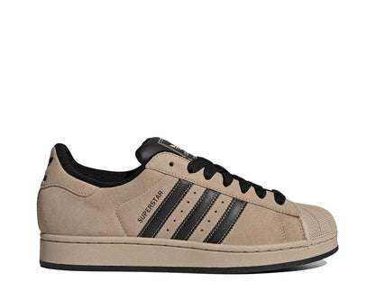 Scarpe da ginnastica in pelle color cachi pietra con design iconico a conchiglia